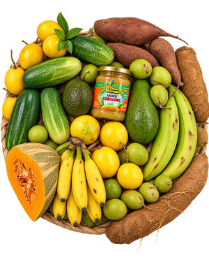Box antillaise grande taille Un bout des Antilles : fruits et légumes frais de Guadeloupe, igname, giraumon, patate douce, pommes liane et pot de sauce créoline douce Dame Besson dans un panier tressé